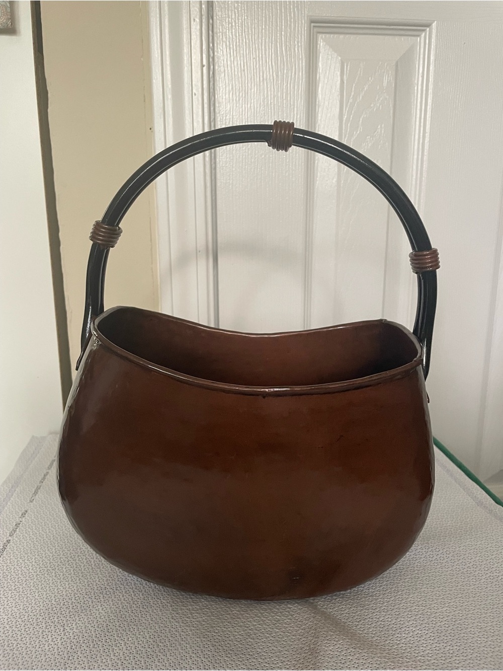 Hammered metal bucket with handle for decorative.